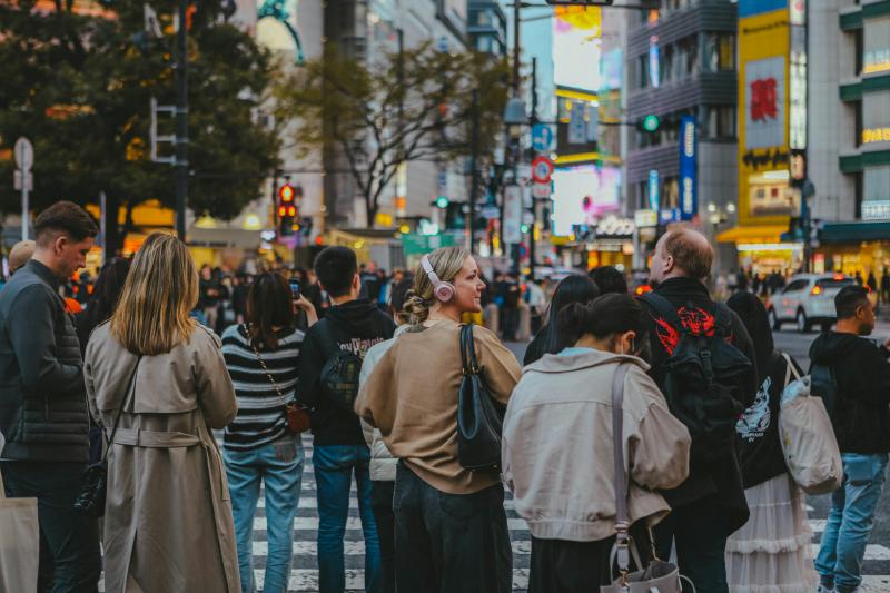 People Experiencing Shibuya Crossing during April in Japan
