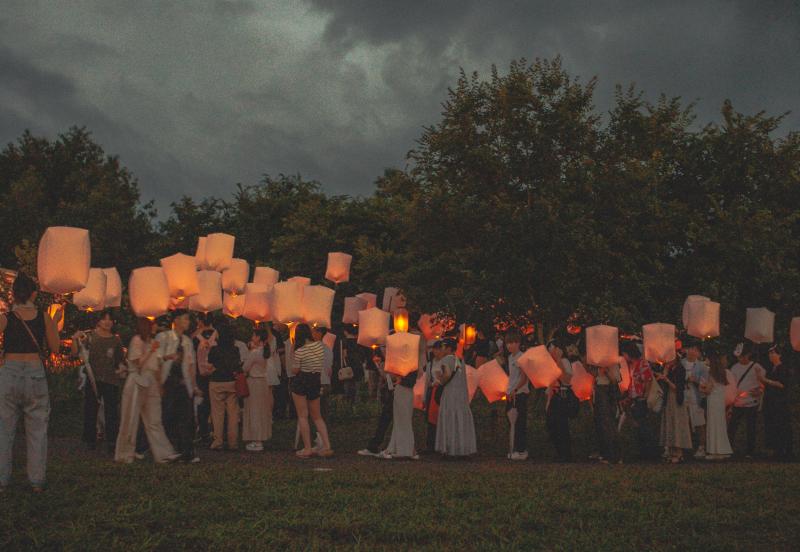People in Kyoto Hold up Paper Lanterns on Tanabata Festival