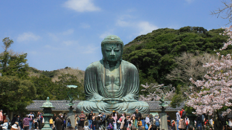 Kamakura's Great Buddha Sits Serenely and Cares for the Bustling Crowds