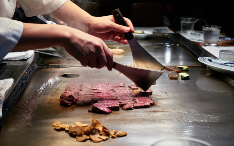 Cooking raw fresh Kobe steak, Japan