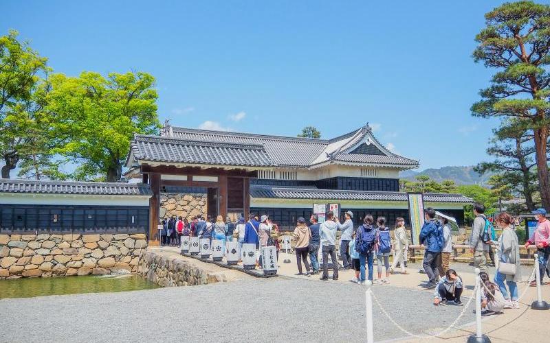 People Visiting Matsumoto Castle in Late May in Japan
