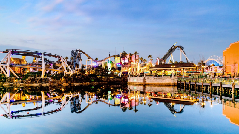 The vibrant lights and thrilling roller coasters of Universal Studios create an exciting atmosphere for visitors.