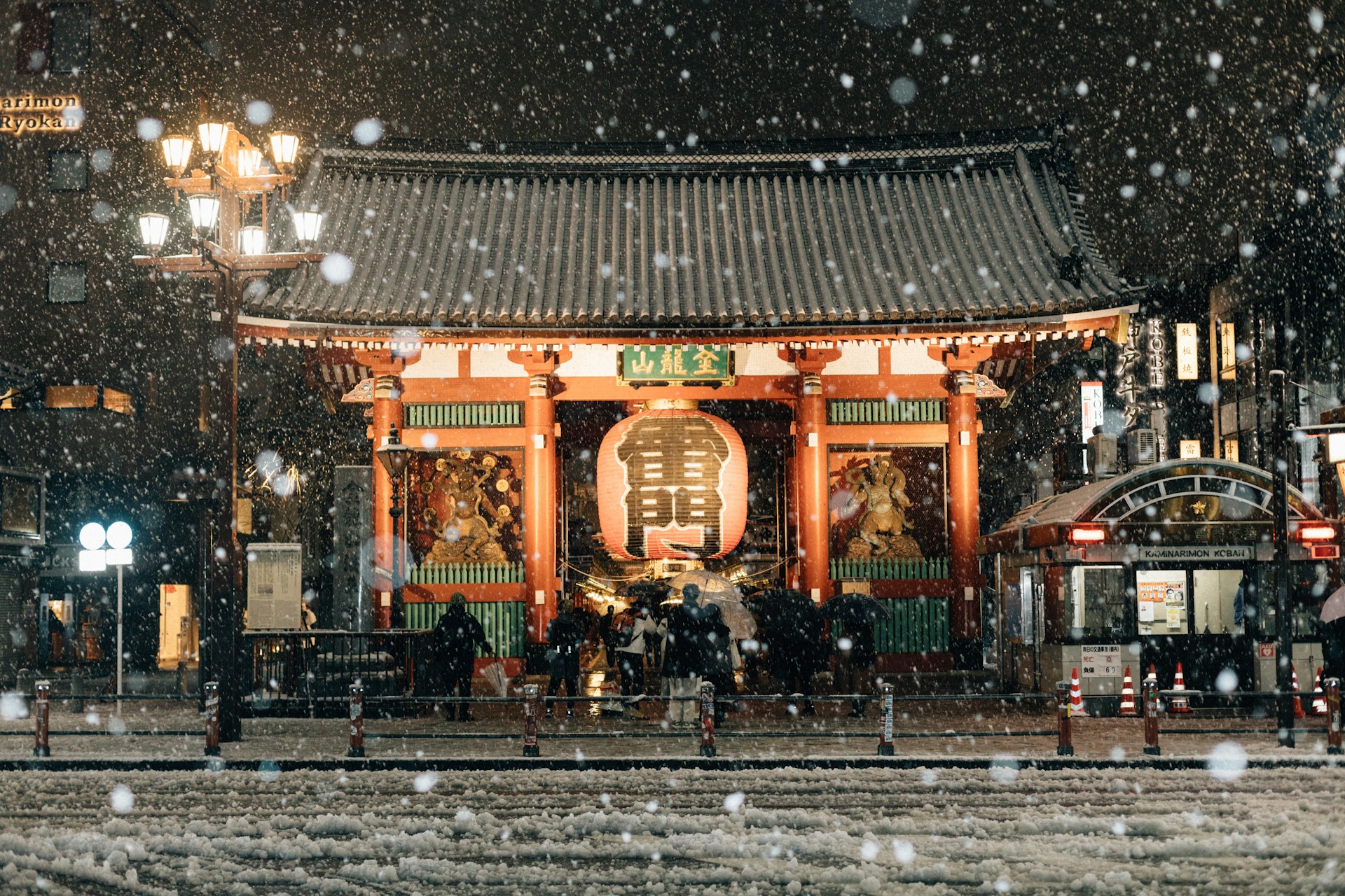 Sensoji Temple glows softly under the falling snow, capturing the quiet magic of a winter night in Tokyo.