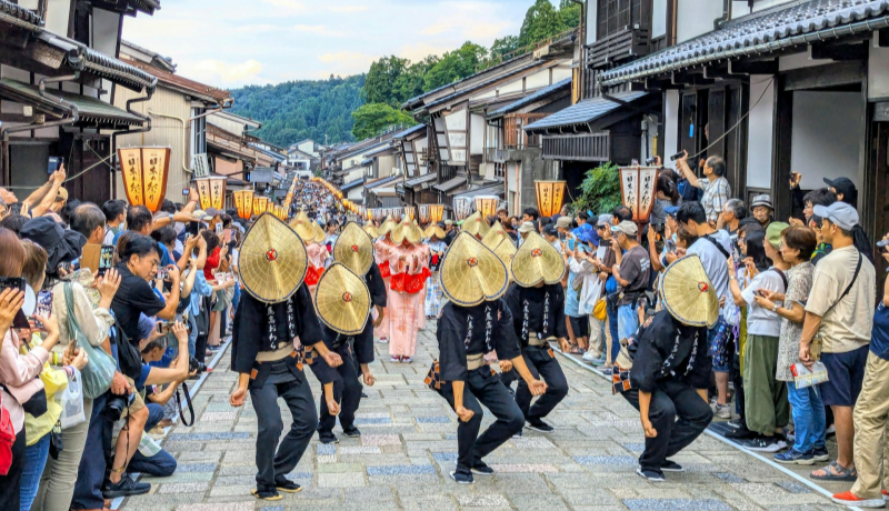 The Obon Festival, held every August in Japan, features lively processions with traditional dance and vibrant costumes.