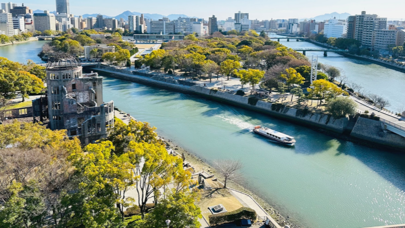 An aerial view of the Atomic Bomb Dome area, where the river winds peacefully through the city of Hiroshima.