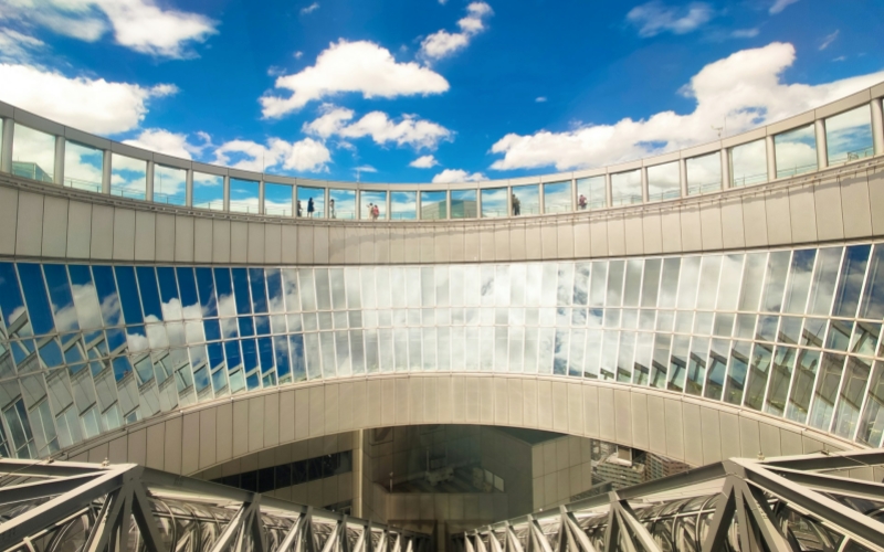 The Umeda Sky Building in Osaka offers stunning panoramic views from its rooftop observation deck.