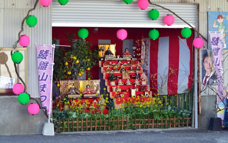 Hinamatsuri Festival display with dolls and decorations.