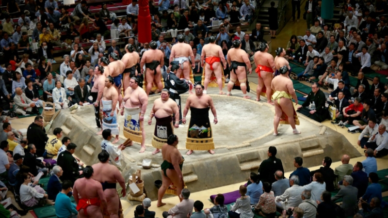 The colorful "Dohyo-iri" ceremony is a must-see cultural spectacle during the May tournament in Tokyo.