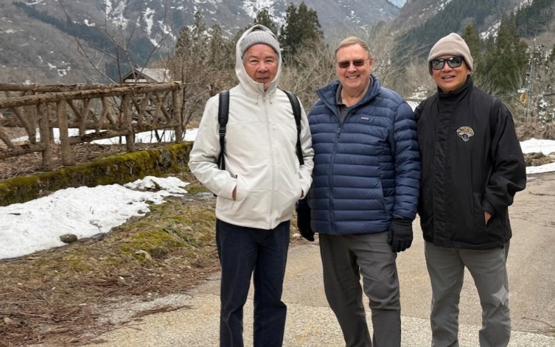 Mountain Hiking Trio Pose Traditional Japanese Village Snow Landscape