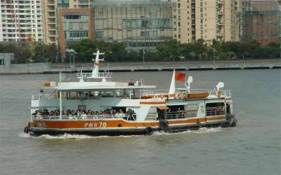 Board a public ferry with the locals cross the Huangpu River